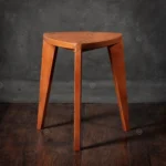 Three Legged Cherry Wood Stool for Rustic Interiors Three Legged Cherry Wood Stool for Rustic Interiors